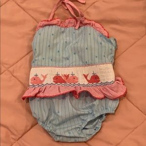 12mo sun suit. GUC. Whale smocked detail.